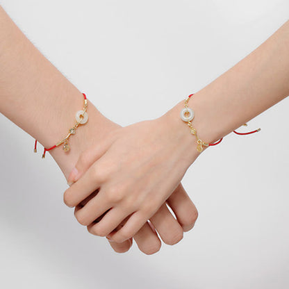 Hetian Jade-Armband mit roter Kordel