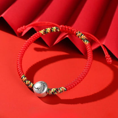Armband mit rotem Faden aus 999er Silber mit Pferdemotiv