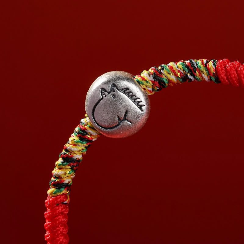 Armband mit rotem Faden aus 999er Silber mit Pferdemotiv
