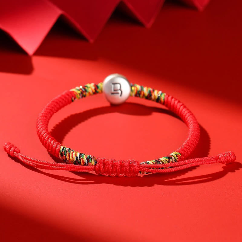 Armband mit rotem Faden aus 999er Silber mit Pferdemotiv