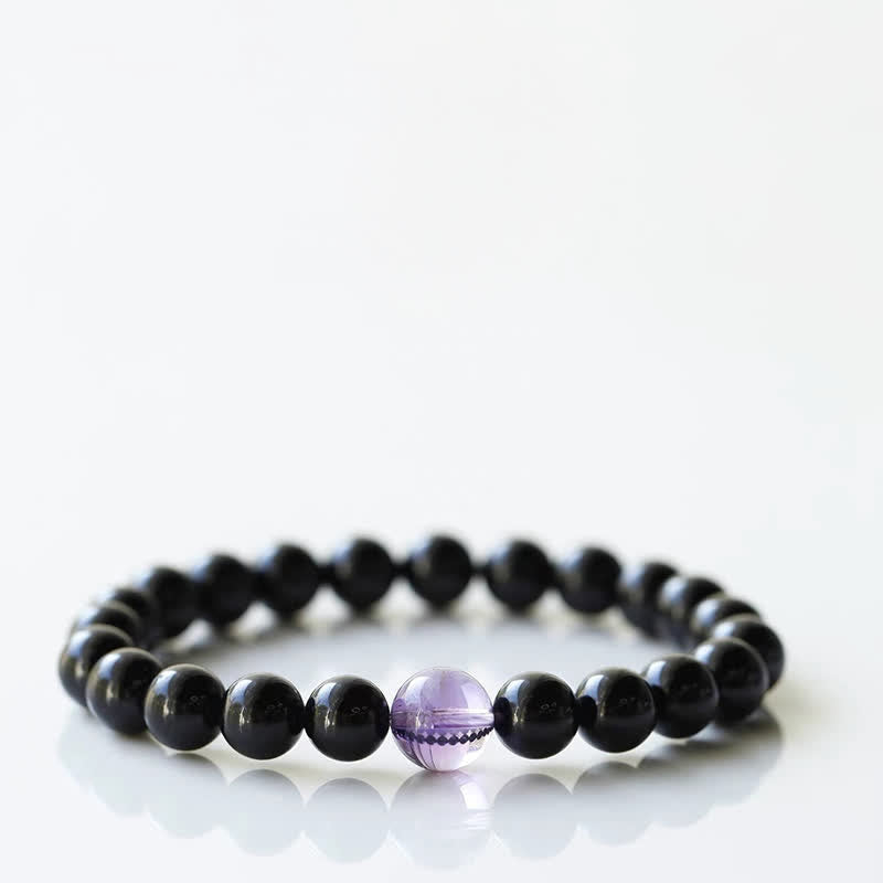 Armband mit schwarzem Turmalin und Sternzeichen-Tiermotiv