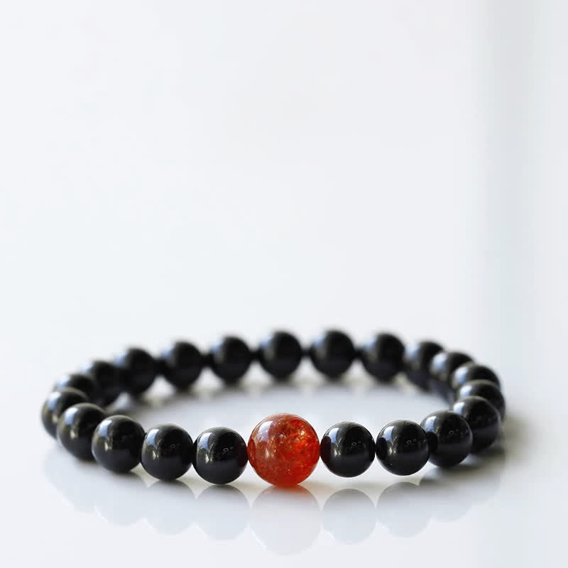 Armband mit schwarzem Turmalin und Sternzeichen-Tiermotiv
