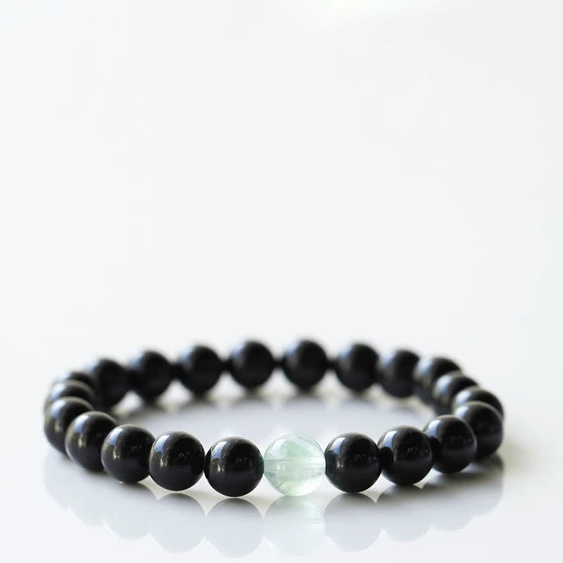 Armband mit schwarzem Turmalin und Sternzeichen-Tiermotiv