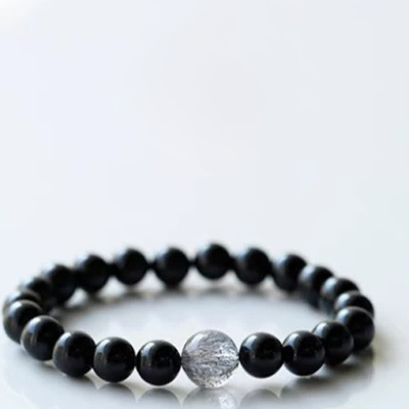 Armband mit schwarzem Turmalin und Sternzeichen-Tiermotiv