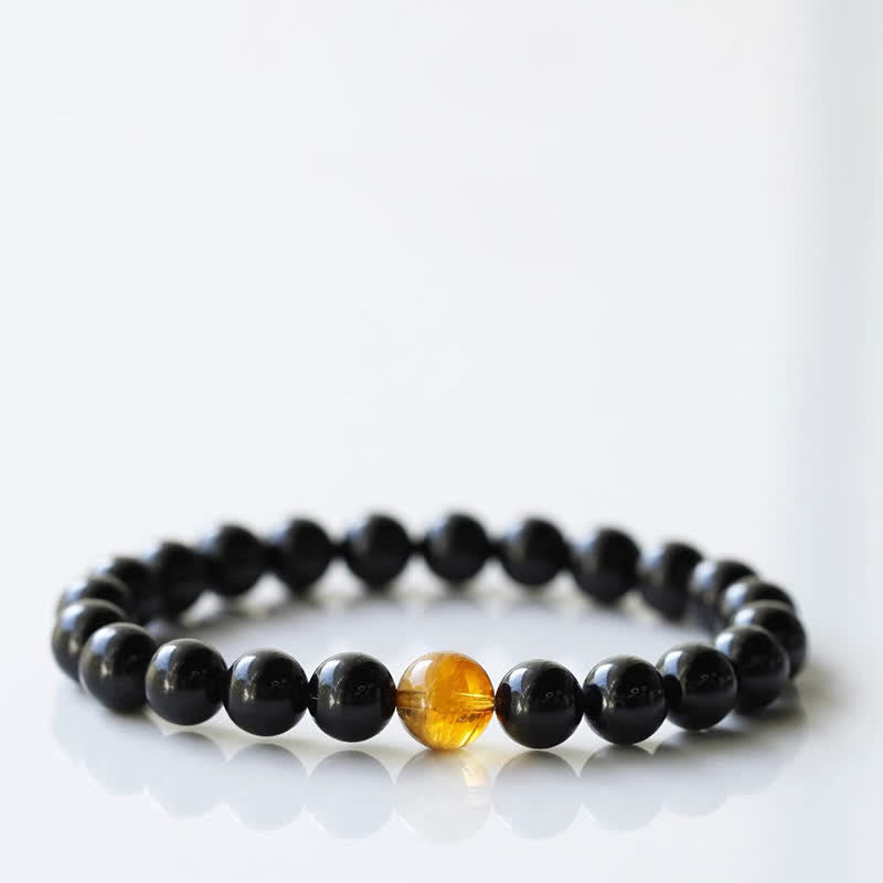 Armband mit schwarzem Turmalin und Sternzeichen-Tiermotiv