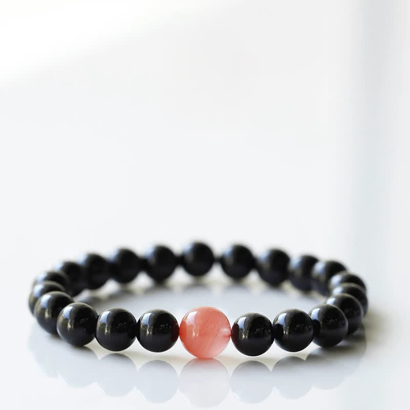 Armband mit schwarzem Turmalin und Sternzeichen-Tiermotiv