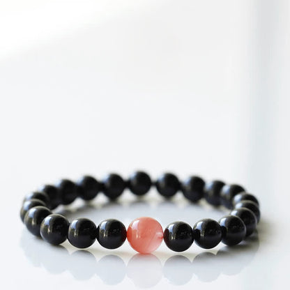 Armband mit schwarzem Turmalin und Sternzeichen-Tiermotiv