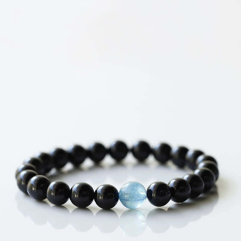 Armband mit schwarzem Turmalin und Sternzeichen-Tiermotiv
