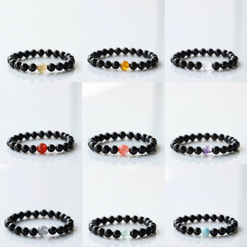 Armband mit schwarzem Turmalin und Sternzeichen-Tiermotiv