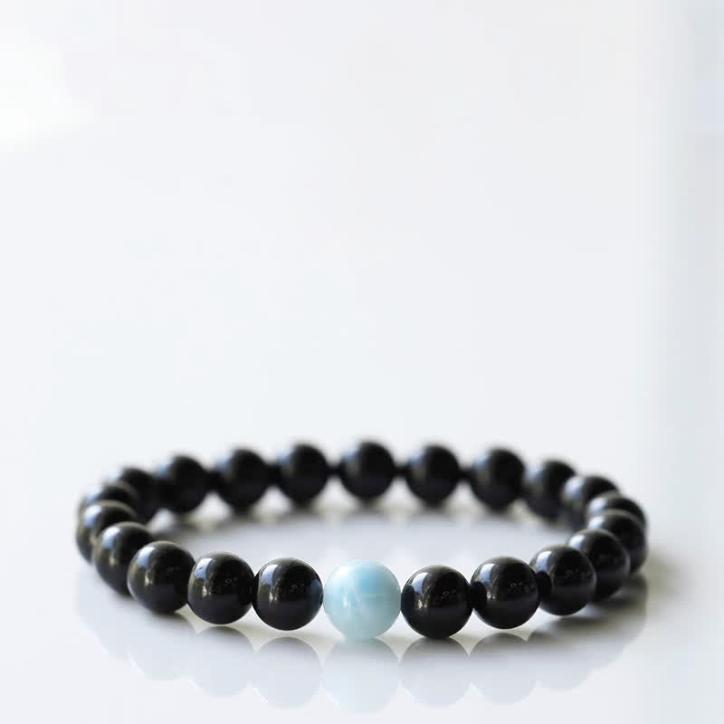 Armband mit schwarzem Turmalin und Sternzeichen-Tiermotiv