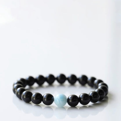 Armband mit schwarzem Turmalin und Sternzeichen-Tiermotiv