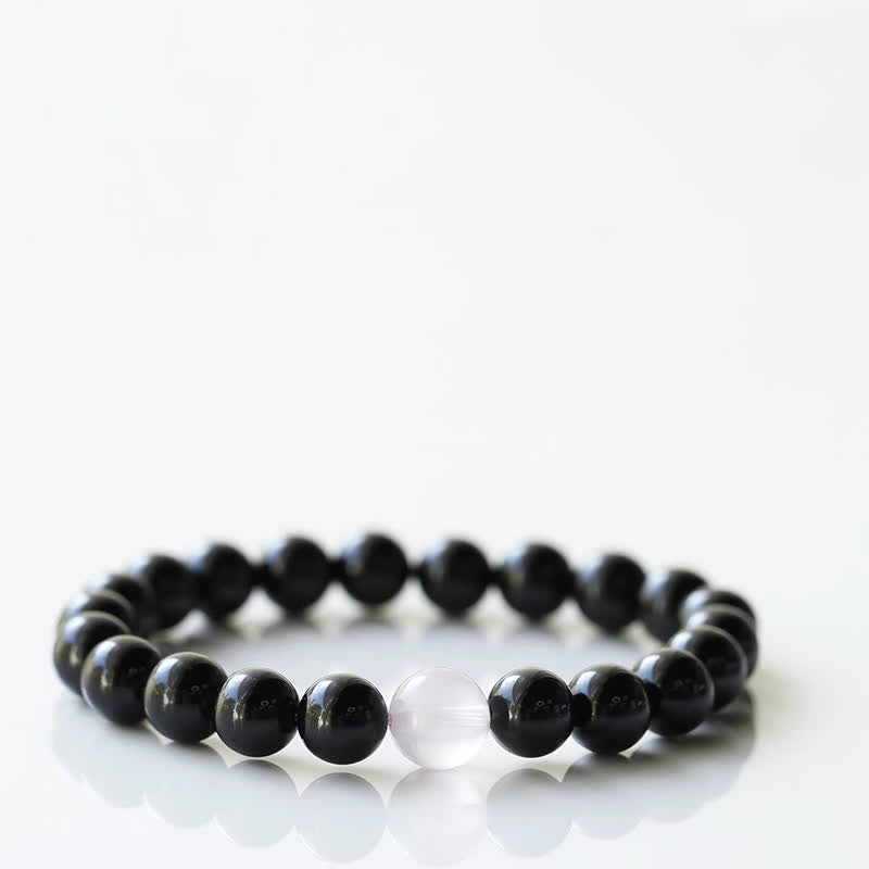 Armband mit schwarzem Turmalin und Sternzeichen-Tiermotiv