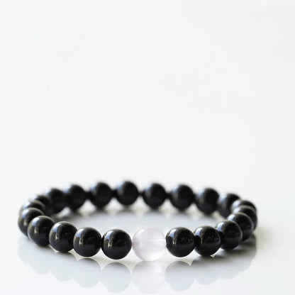 Armband mit schwarzem Turmalin und Sternzeichen-Tiermotiv