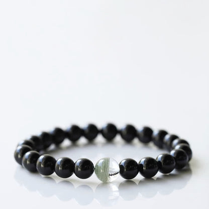 Armband mit schwarzem Turmalin und Sternzeichen-Tiermotiv