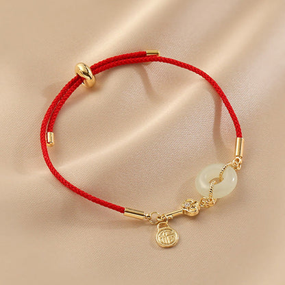 Hetian Jade-Armband mit roter Kordel