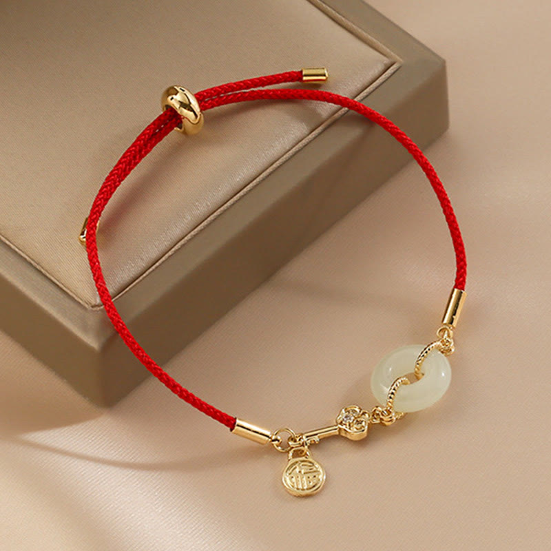 Hetian Jade-Armband mit roter Kordel