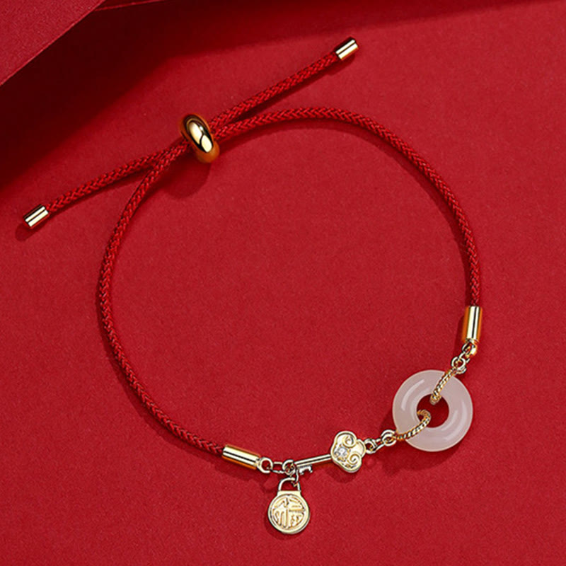 Hetian Jade-Armband mit roter Kordel