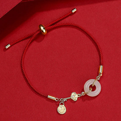 Hetian Jade-Armband mit roter Kordel