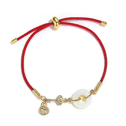 Hetian Jade-Armband mit roter Kordel