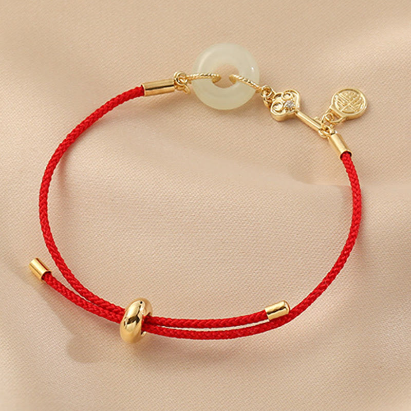 Hetian Jade-Armband mit roter Kordel