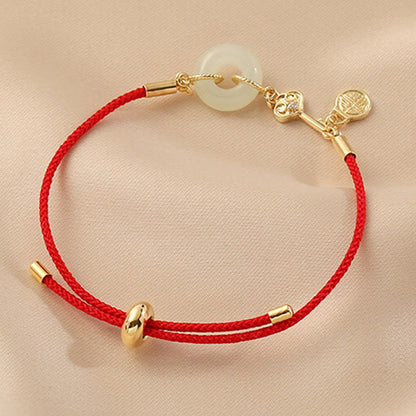 Hetian Jade-Armband mit roter Kordel