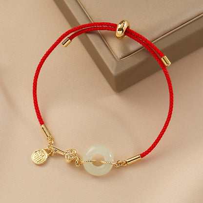 Hetian Jade-Armband mit roter Kordel