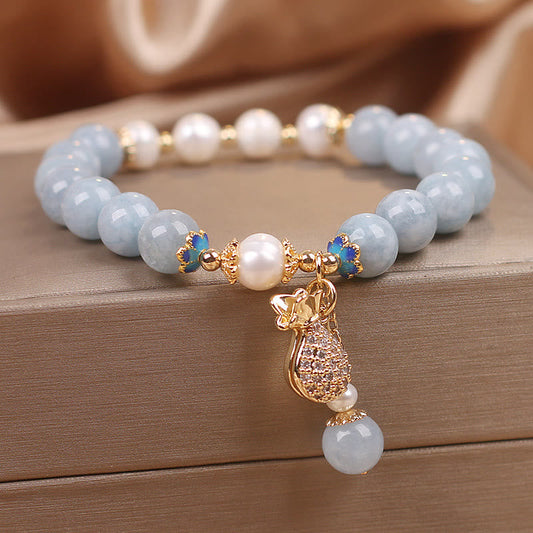 Aquamarine Pearl Money Bag Charm Bracelet by Worn Within