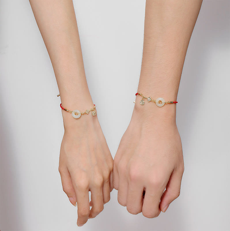 Hetian Jade-Armband mit roter Kordel