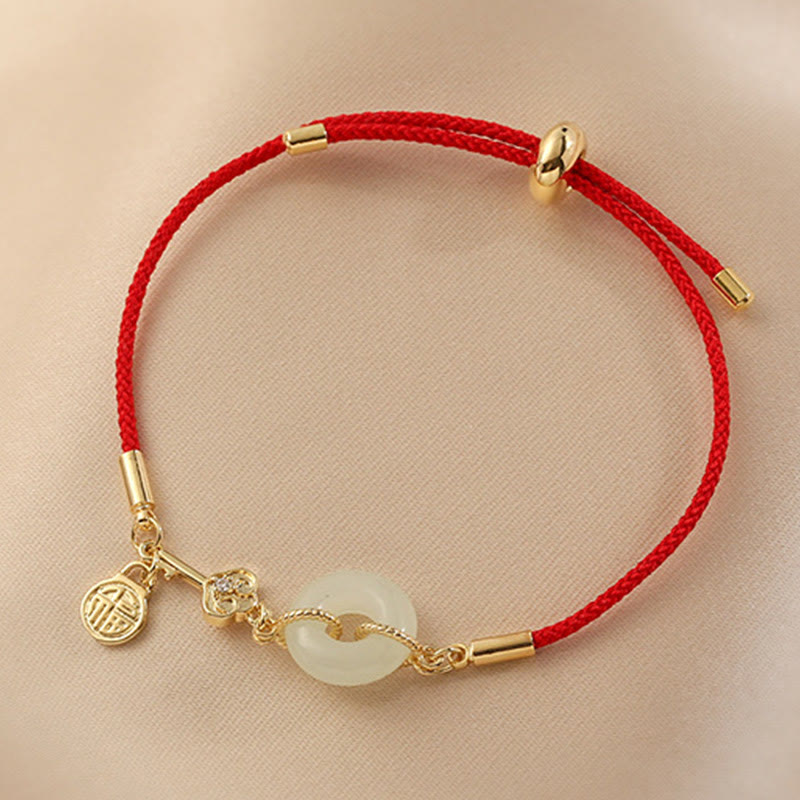 Hetian Jade-Armband mit roter Kordel