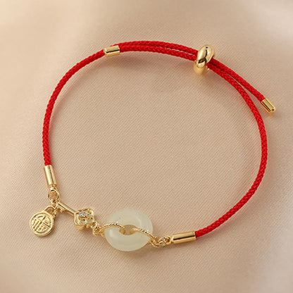 Hetian Jade-Armband mit roter Kordel